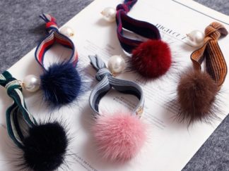 Agogo con Pompón y Perlitas